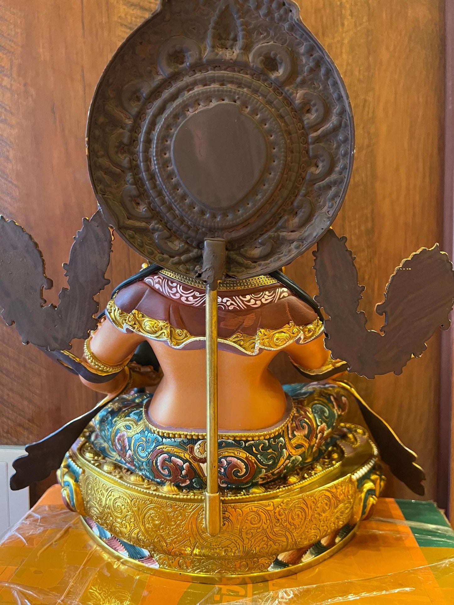 Handcrafted Yellow Dzambhal Brass Statue – Nepalese Style Tibetan Buddhist Deity with Painted Back Panel (9 inch)