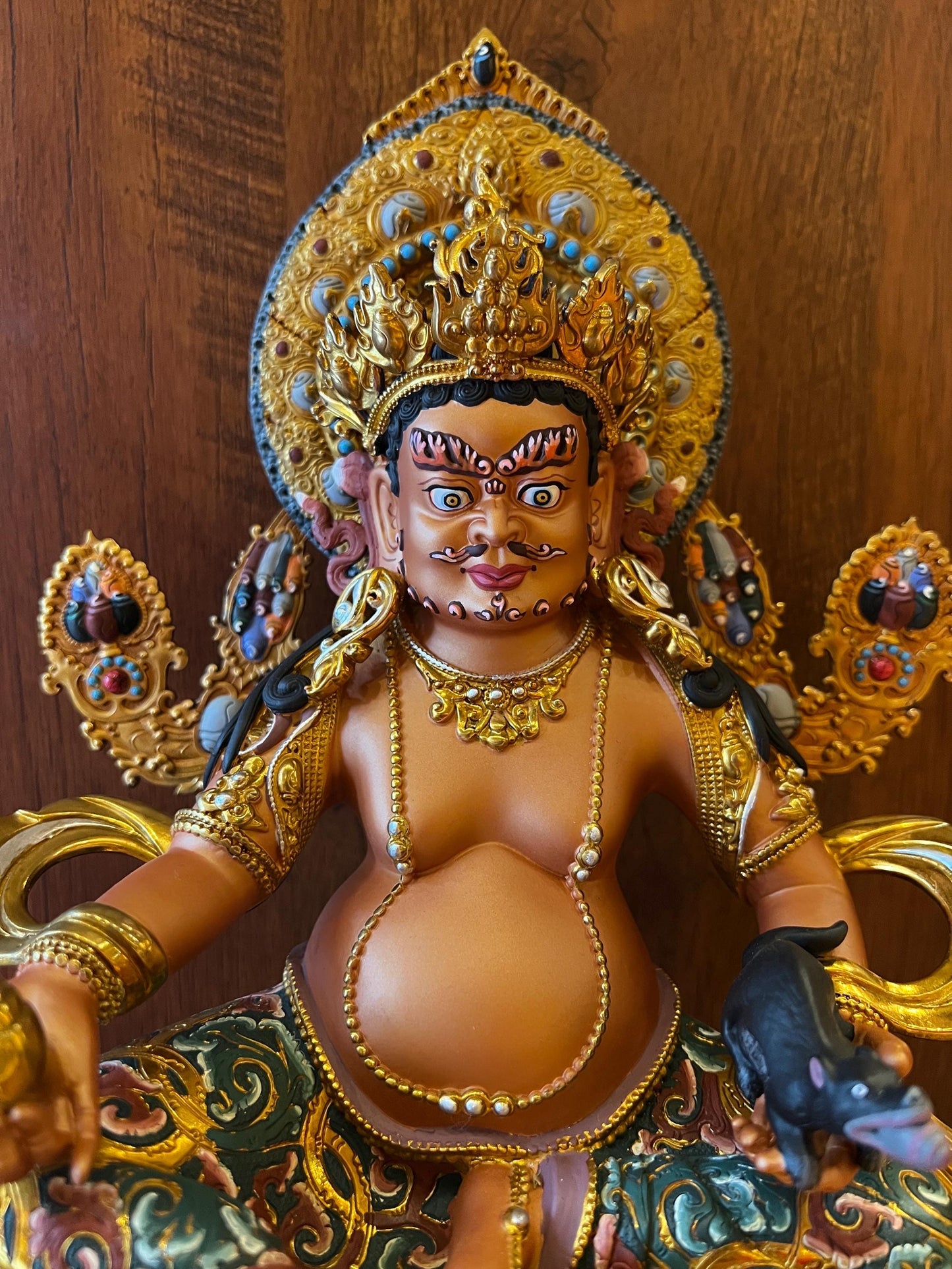 Handcrafted Yellow Dzambhal Brass Statue – Nepalese Style Tibetan Buddhist Deity with Painted Back Panel (9 inch)