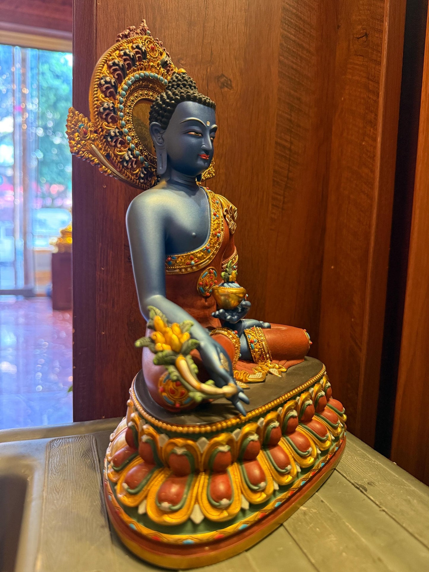 Handcrafted Blue Medicine Buddha Statue – Nepalese Style Tibetan Buddhist Deity with Painted Back Panel (9 inch)