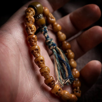 Handcrafted Yak Bone Skull Mala Bracelet: Tibetan Prayer Beads