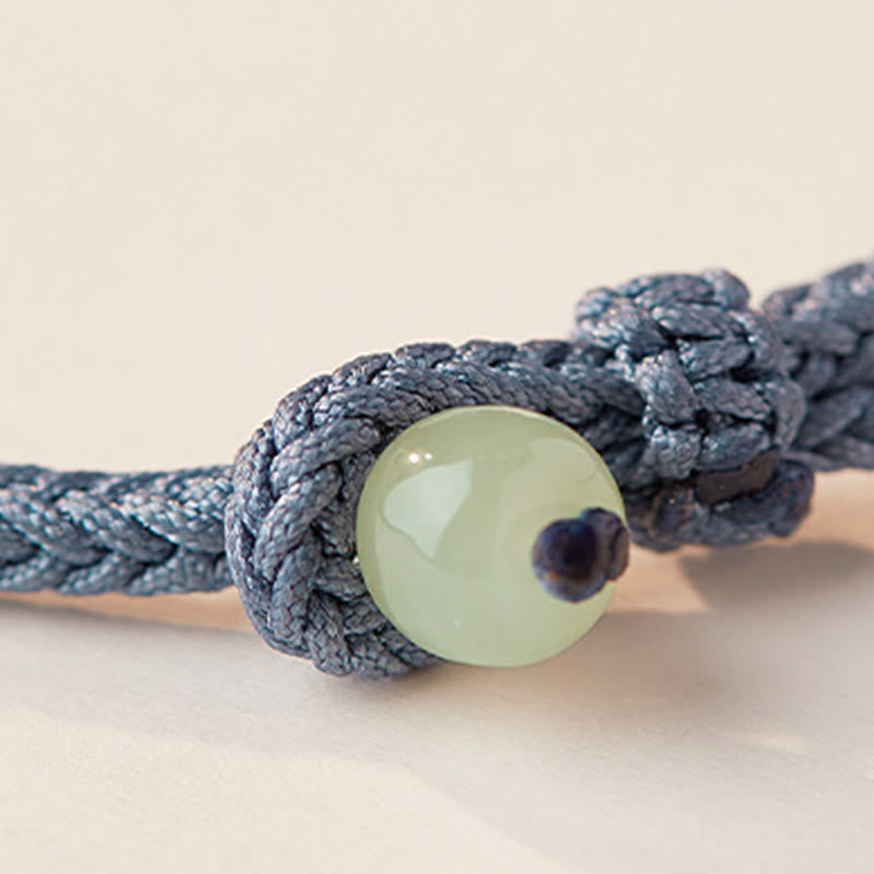 Pulsera de cordón trenzado con disco de jade Hetian y loto