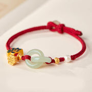 Pulsera de cordón trenzado con disco de jade Hetian y loto