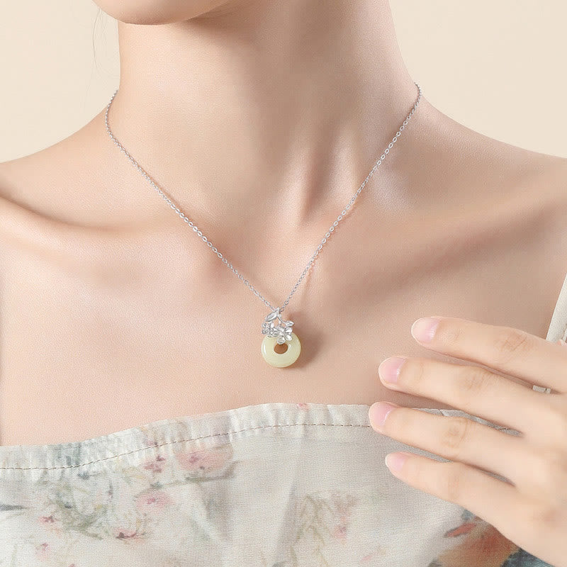 EverestArtstudios Hetian Jade 999 Sterling Silver Peace Buckle Peach Blossom Necklace Pendant