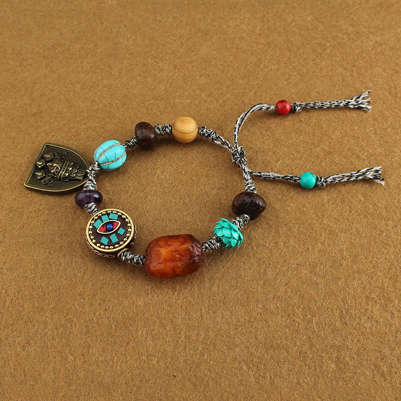 EverestArtStudios Tibetan Buddha's Eye Turquoise Lotus Zakiram Protection Rope Bracelet