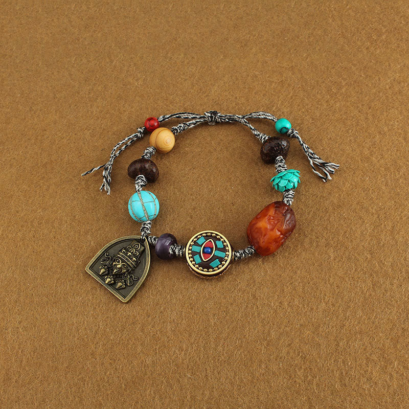 EverestArtStudios Tibetan Buddha's Eye Turquoise Lotus Zakiram Protection Rope Bracelet