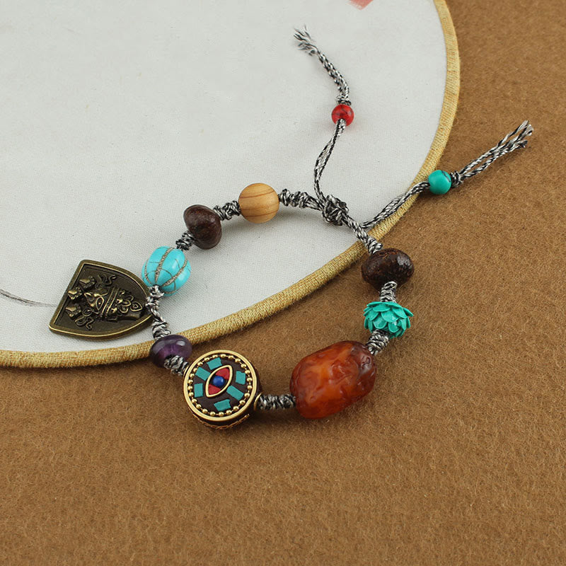 EverestArtStudios Tibetan Buddha's Eye Turquoise Lotus Zakiram Protection Rope Bracelet