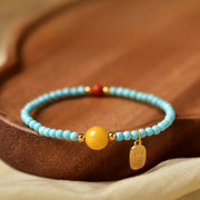 EverestArtStudios Turquoise Fu Character Luck Handcrafted Beaded Bracelet