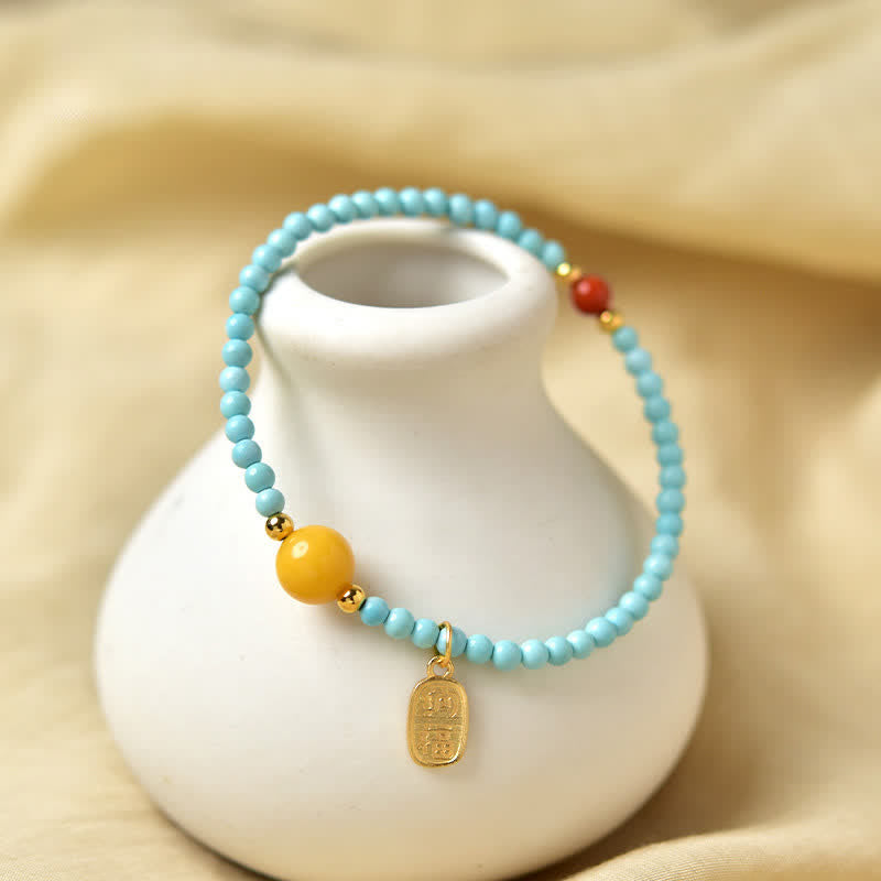 EverestArtStudios Turquoise Fu Character Luck Handcrafted Beaded Bracelet
