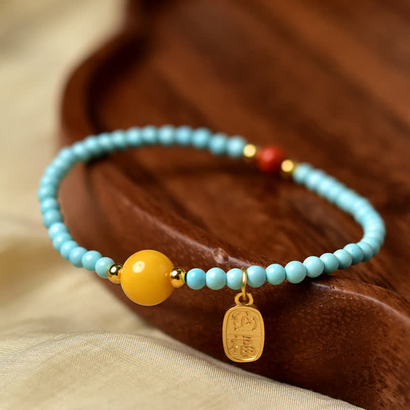 EverestArtStudios Turquoise Fu Character Luck Handcrafted Beaded Bracelet