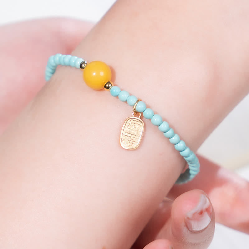 EverestArtStudios Turquoise Fu Character Luck Handcrafted Beaded Bracelet