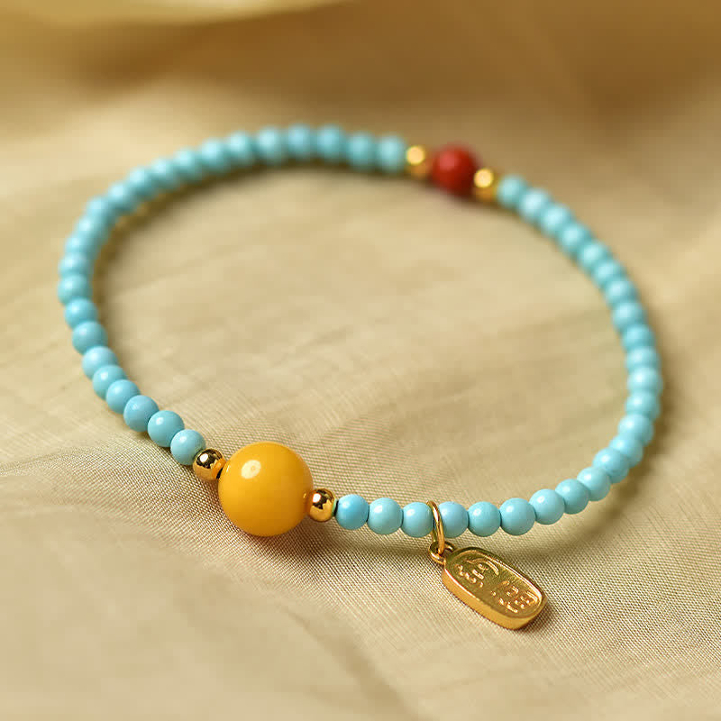 EverestArtStudios Turquoise Fu Character Luck Handcrafted Beaded Bracelet