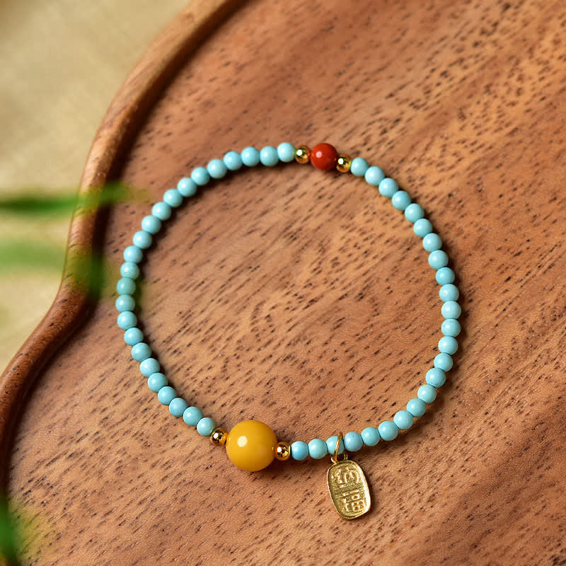 EverestArtStudios Turquoise Fu Character Luck Handcrafted Beaded Bracelet