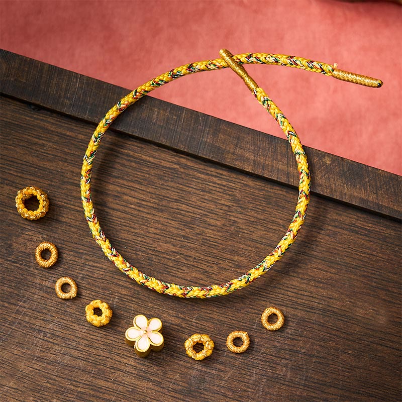Buddha Stones Yellow Braided Rope Flower Rootedness Bracelet