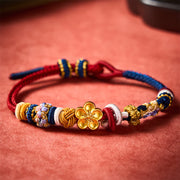 Buddha Stones Hand-Woven Peach Blossom Strength Red Navy String Bracelet