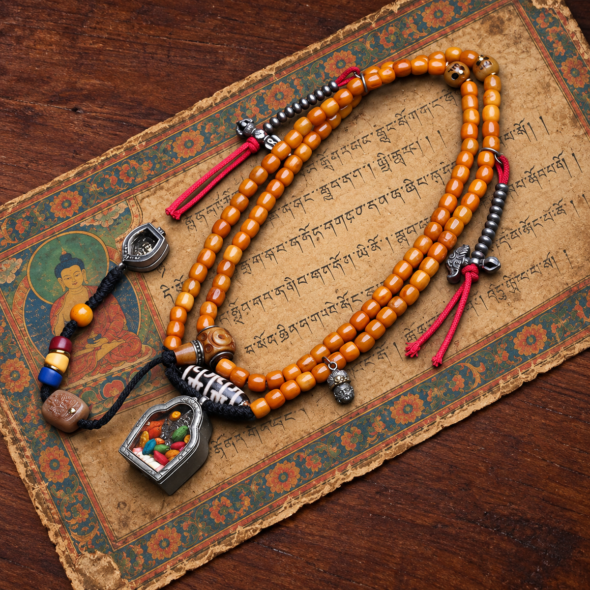 EverestArtstudios Bone 108-Bead Mala with Ghau and Zakiram-Inspired Pendant — styled on wood with a scripture display prop
