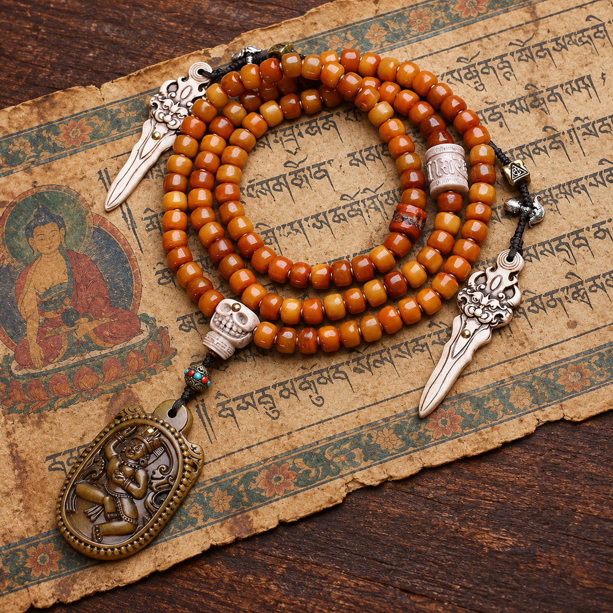 EverestArtstudios Yak Bone 108-Bead Mala with Vajrayogini-Inspired Pendant — styled on wood with a scripture display prop