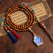 EverestArtstudios Medicine Buddha Symbol 108-Bead Mala with Brown Beads and Colorful Tassels