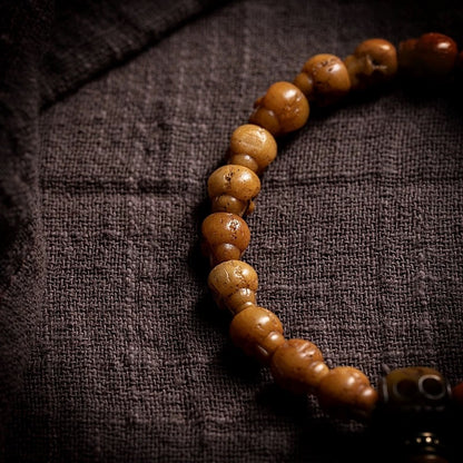 Handcrafted Yak Bone Skull Mala Bracelet: Tibetan Prayer Beads