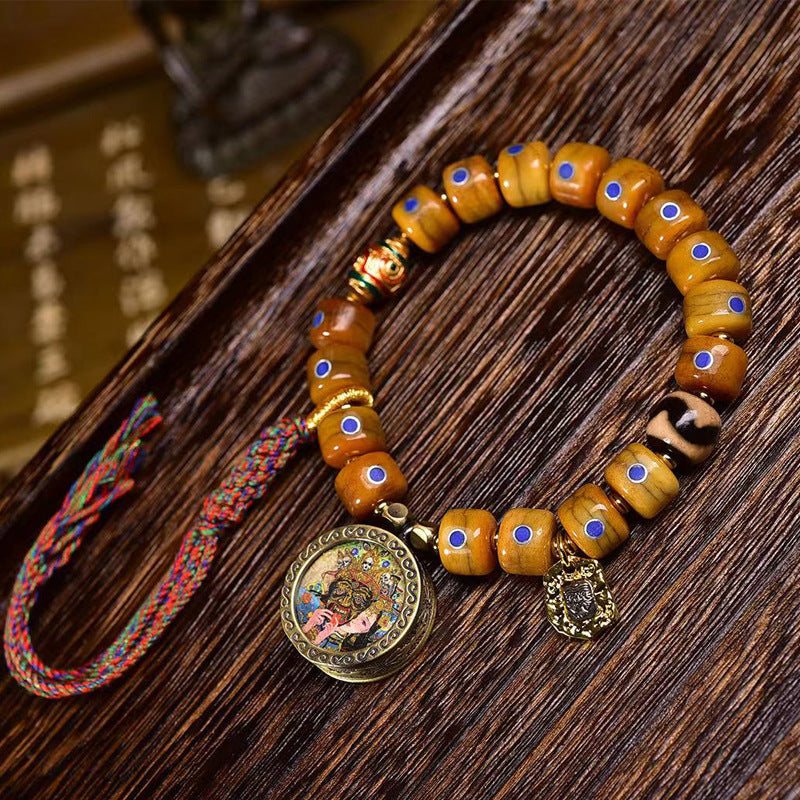 EverestArtstudios Yak Bone Lapis Inlay Thangka Charm Bracelet