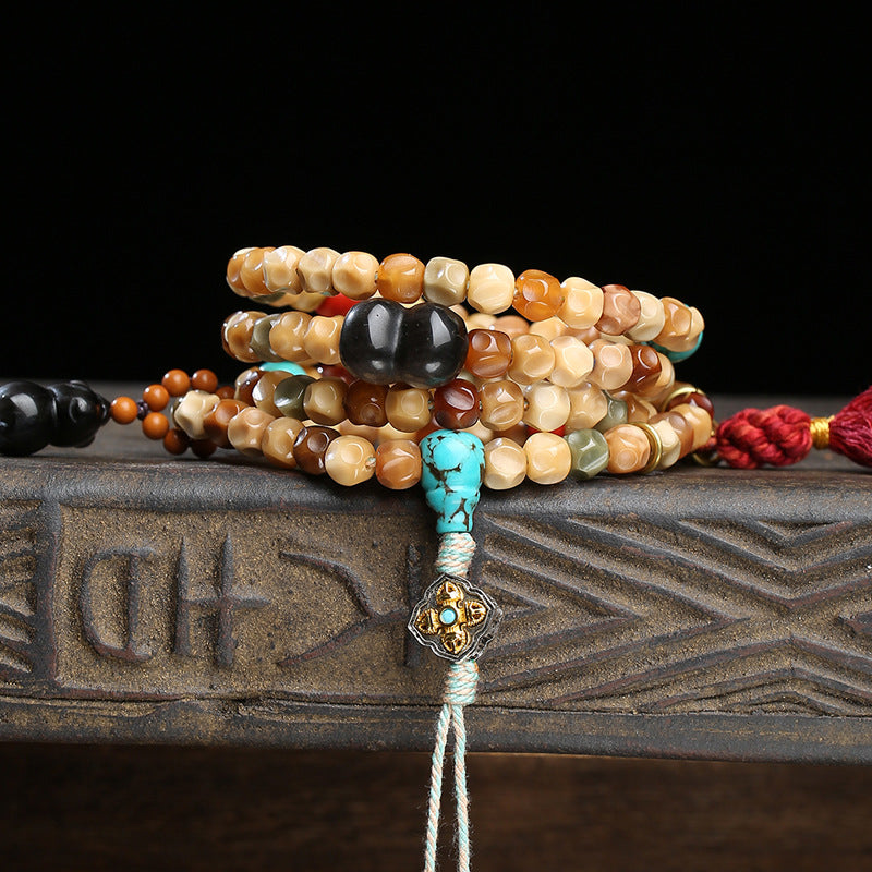 EverestArtstudios Faceted Bodhi 108-Bead Mala with Turquoise and Obsidian Accents