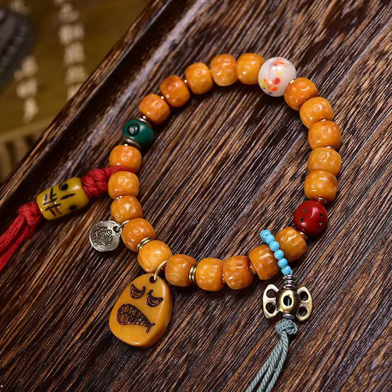 EverestArtstudios Bone Textured Barrel Bead Garuda Accent Bracelet
