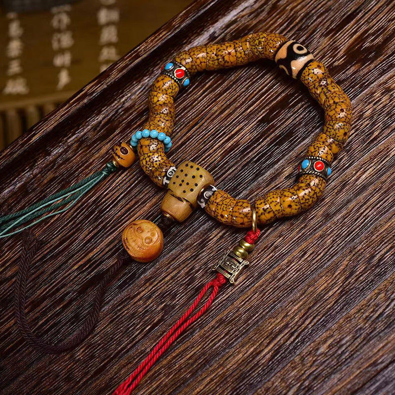 EverestArtstudios Xingyue Bodhi Seed Sculpted Bead Tassel Bracelet
