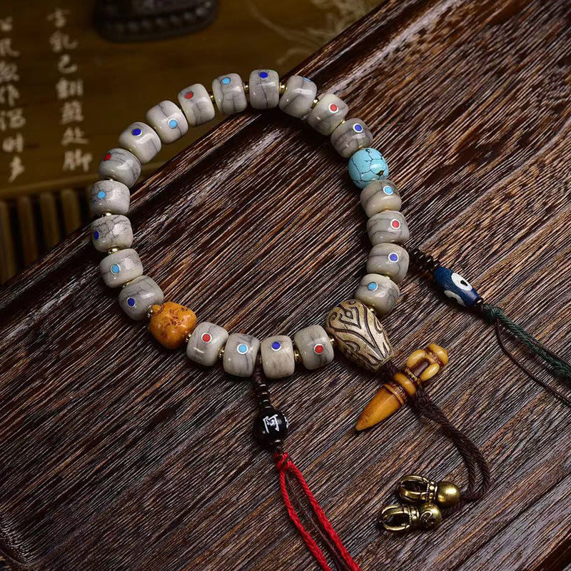 EverestArtstudios Bone Inlaid Barrel Bead Tassel Bracelet