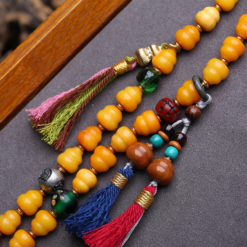 Tibetan return bone carving Fulu oblique span gourd yak bone back cloud agate tiger tooth dzi bead material glazed accessories