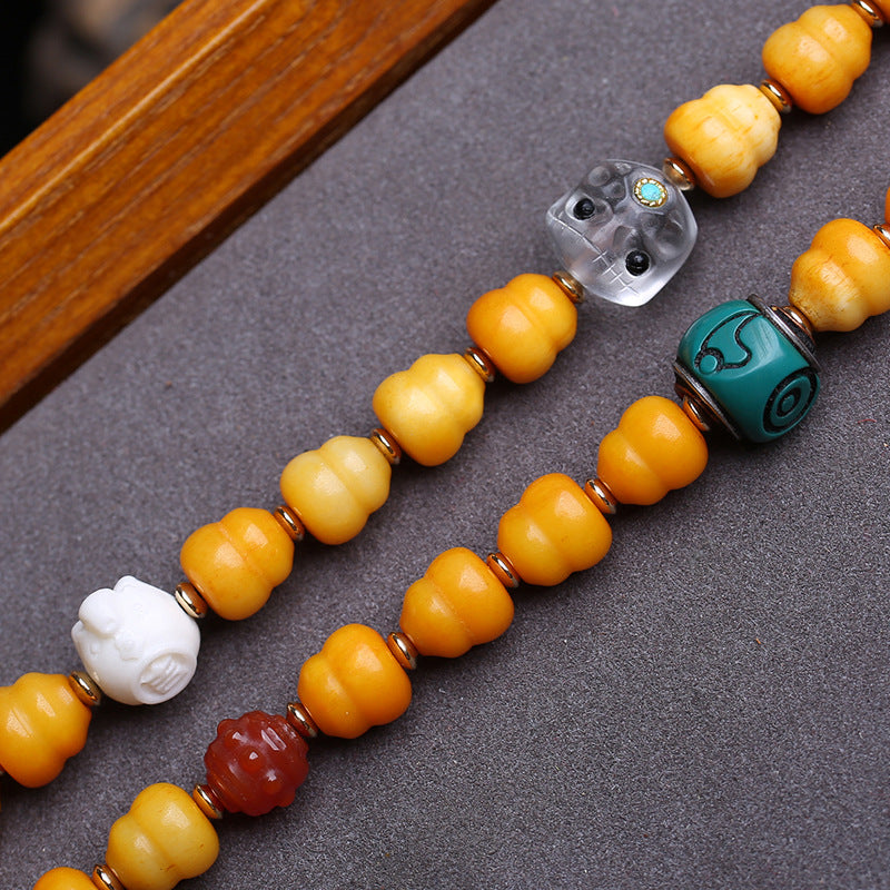 Tibetan return bone carving Fulu oblique span gourd yak bone back cloud agate tiger tooth dzi bead material glazed accessories