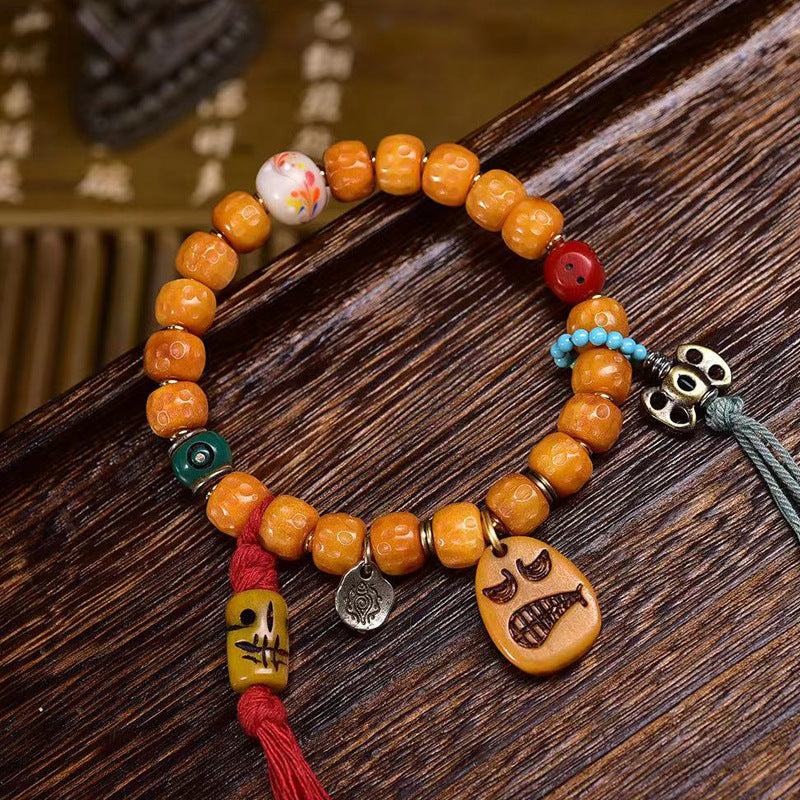 EverestArtstudios Bone Textured Barrel Bead Garuda Accent Bracelet