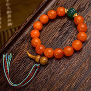 EverestArtstudios Reclaimed Golden Turtle Bead Tassel Bracelet
