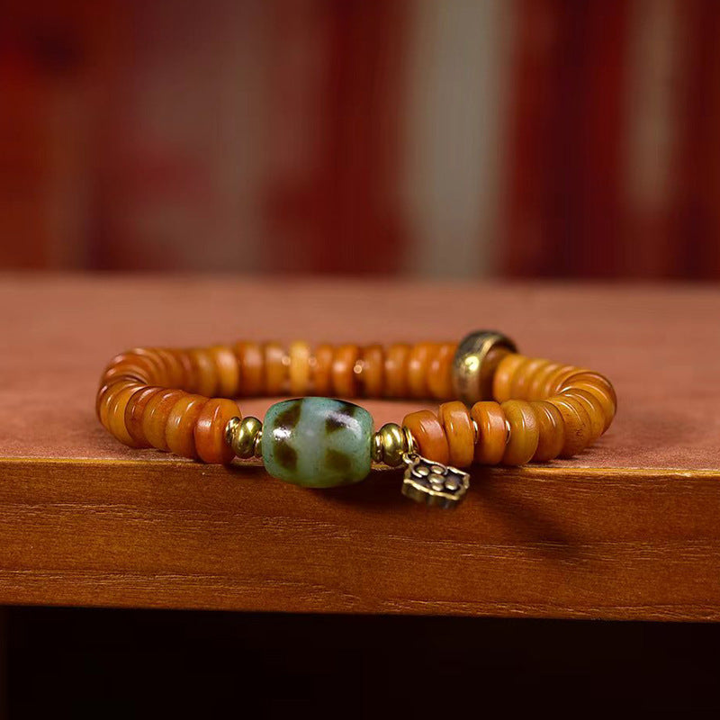 EverestArtstudios Bone Disc Bead Agate Dzi-Style Bracelet