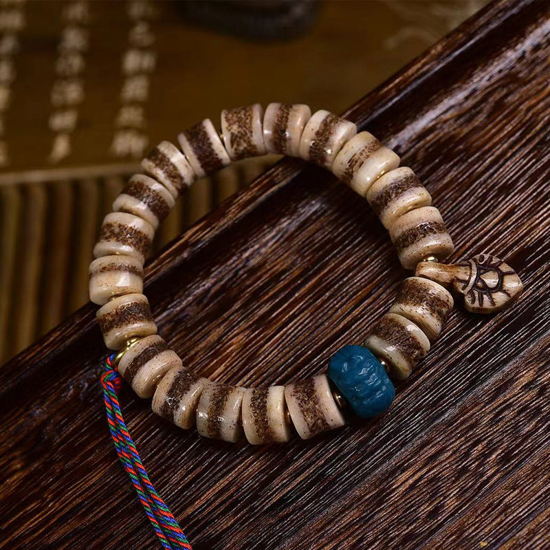 EverestArtstudios Yak Bone Textured Barrel Bead Bracelet
