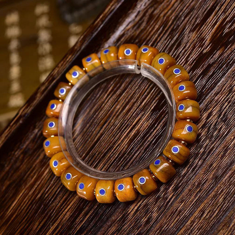 EverestArtstudios Yak Bone Lapis Inlay Thangka Charm Bracelet