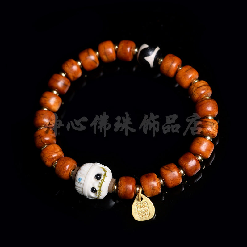EverestArtstudios Bone Agate Dzi-Style Tassel Bracelet