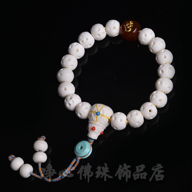 EverestArtstudios Deer Bone Openwork Bead Tassel Bracelet