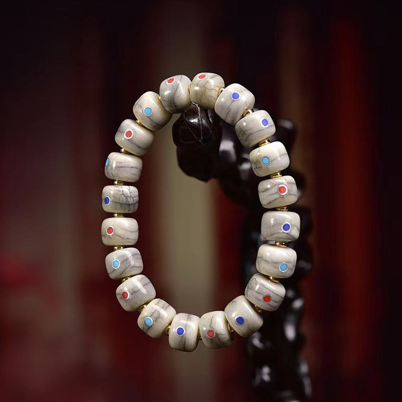 EverestArtstudios Bone Inlaid Barrel Bead Tassel Bracelet