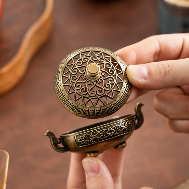 Binaural antique incense burner exquisite pattern hollow three-legged burner household indoor Xuande burner plate incense burner desktop ornament