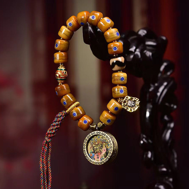 EverestArtstudios Yak Bone Lapis Inlay Thangka Charm Bracelet