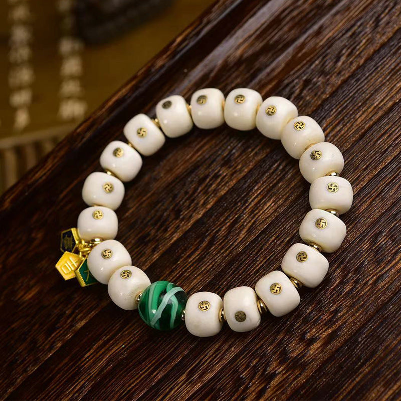 EverestArtstudios Antler Auspicious Symbol Barrel Bead Bracelet