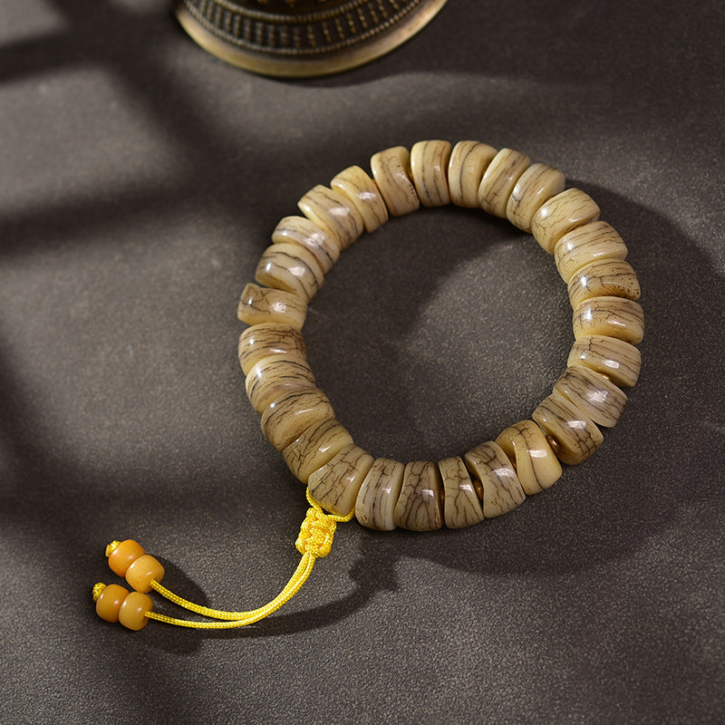 EverestArtstudios Camel Bone Sculpted Bead Dzi-Style Charm Bracelet