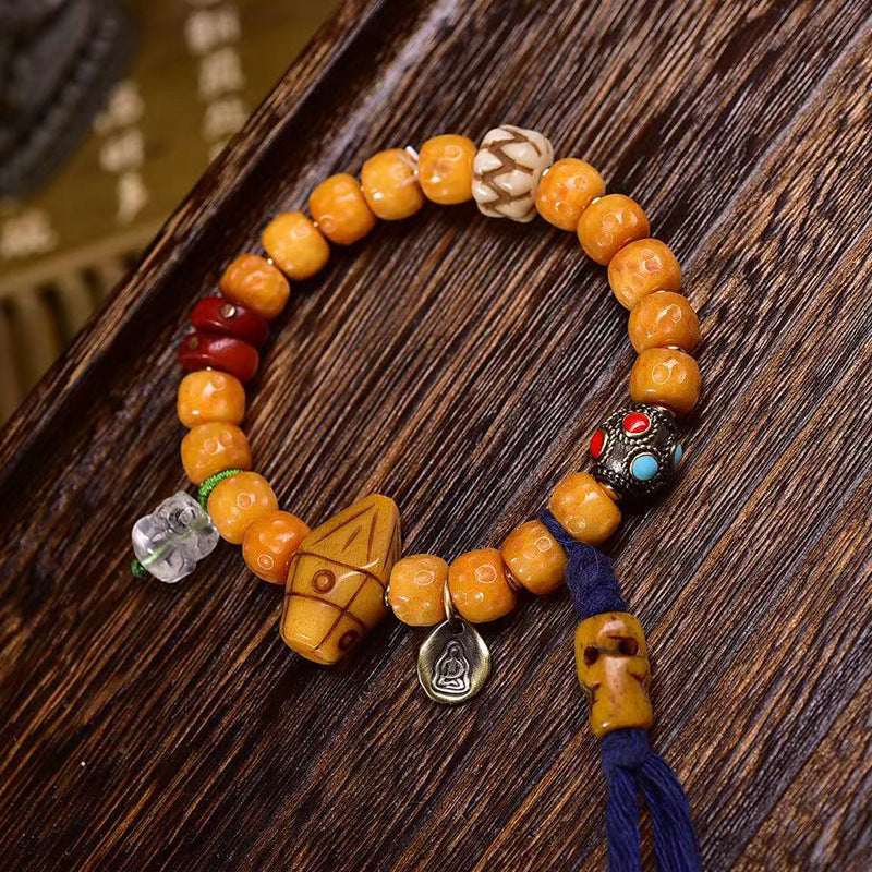 EverestArtstudios Bone Textured Barrel Bead Garuda Accent Bracelet
