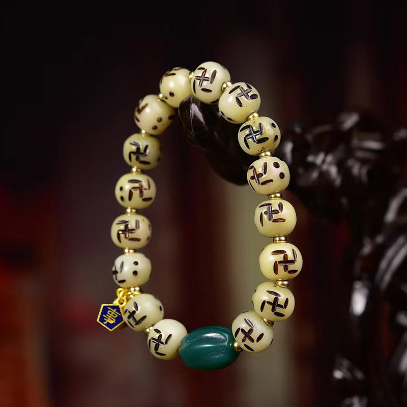 EverestArtstudios Bone Auspicious Symbol Carved Bead Bracelet