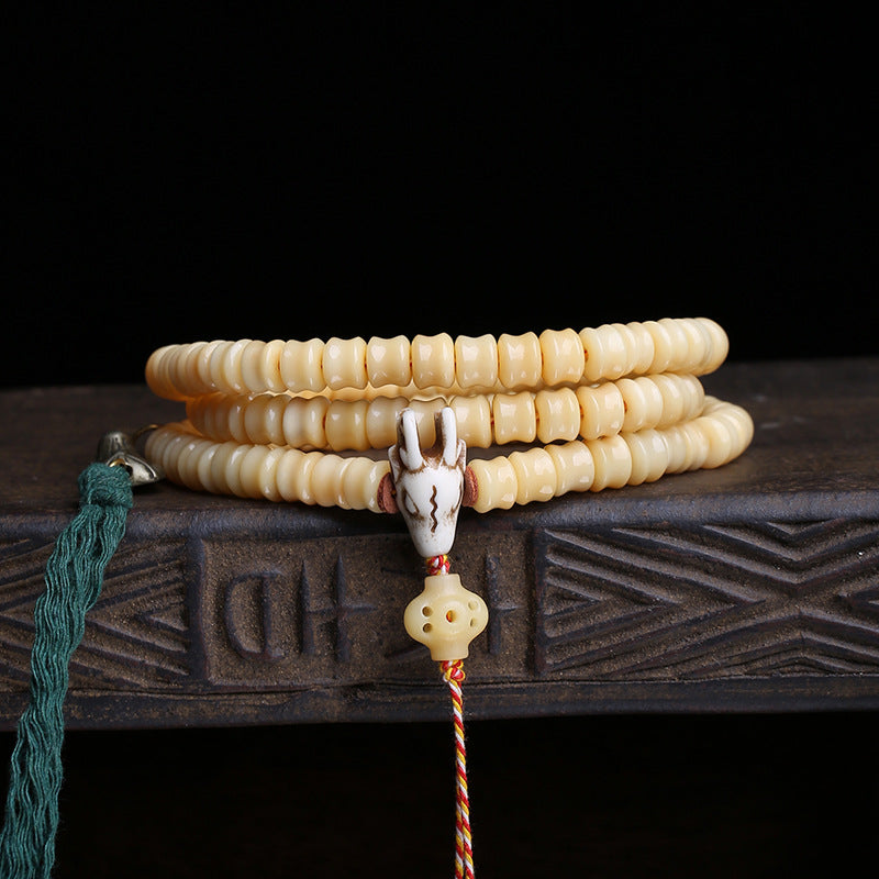 Tibetan return bone carving is 108 Buddha beads high, multi-circle bracelet plate playing beaded Tibetan side hanging copper accessories