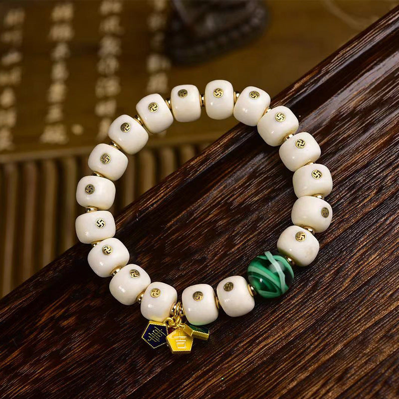 EverestArtstudios Antler Auspicious Symbol Barrel Bead Bracelet
