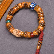 EverestArtstudios Bone Carved Motif Bead Bracelet