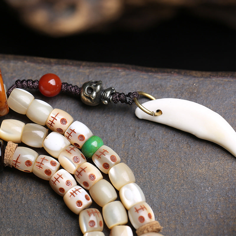 EverestArtstudios Carved Fish Bone 108-Bead Mala with Colorful Accents and Curved Pendant