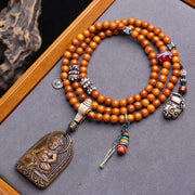 108 Buddhist beads, rosary beads, round beads engraved with yellow God of Wealth pendant and glazed yak bone accessories.