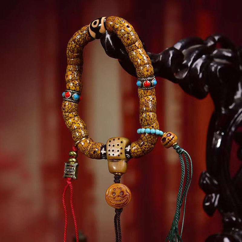 EverestArtstudios Xingyue Bodhi Seed Sculpted Bead Tassel Bracelet