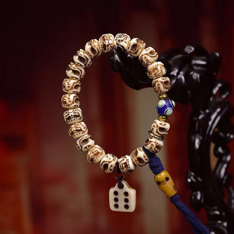EverestArtstudios Bone Garuda Motif Copper Accent Bracelet